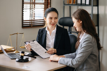 Judge gavel with scales of justice, Business and lawyer or counselor consulting and discussing...