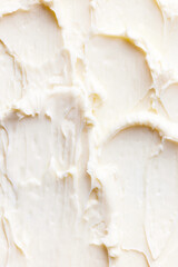 Close-up of organic, homemade butter with textured waves on it. Healthy eating. Concept of food texture, taste, organic products, cooking. Background, wallpaper, poster