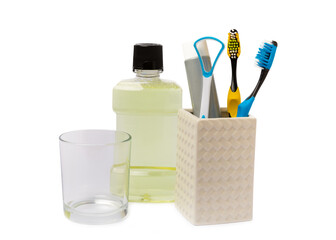 Toothbrush, mouthwash, floss, tongue cleaner and toothpaste isolated on white background. Items for dental care and caries prevention in the bathroom. Dentistry concept