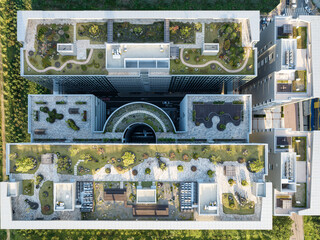 Aerial view of rooftop garden in urban residential area.