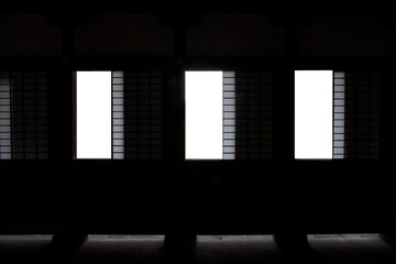 Abstract Windows of a traditional Japanese house, silhouetted image, with a white background in the middle.