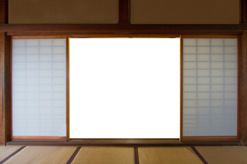 View from the door of an ancient Japanese house and tatami mat. There is a white blackground in the middle