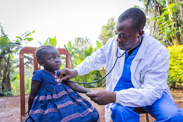 African young Pediatrician visiting at home a sick toddler. Pediatrics concept