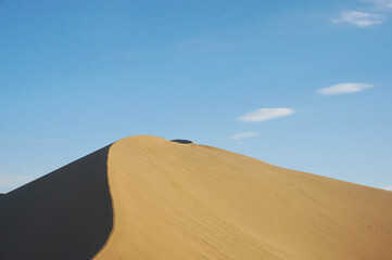 Fototapeta na wymiar Desert in Dunhuang, China and blue sky in a dry climate. Super for background
