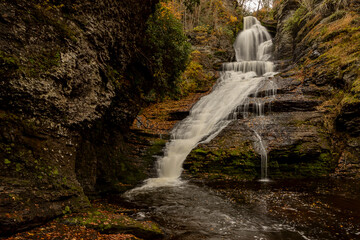 Fototapeta na wymiar Dingmans Falls cascade down the mountain in Pennsylvania