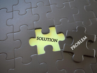 Fototapeta premium Motivational and inspirational wording. Problem solving concept. PROBLEM and SOLUTION written on puzzle pieces. With blurred styled background.