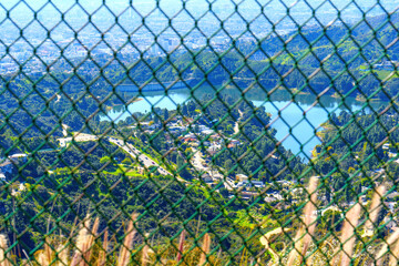 Panoramic Overlook of Hollywood Reservoir through a Wire Fence