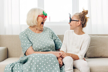 Family sofa love grandmother grandchild happy together home child christmas