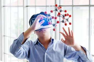 Boy with molecular study experiment.