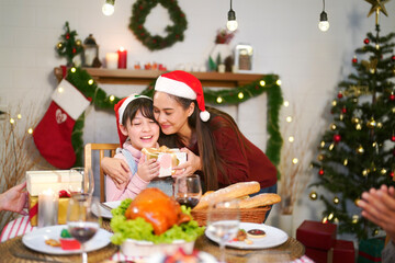 Merry Christmas and Happy New Year 2024!Multiracial young creative family are celebrating holiday.