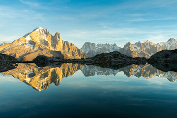 Mountains and Reflection in Lac Blanc Lake at Sunset. Golden Hour. Chamonix, French Alps, France