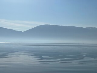 morning sun rising over lake Ohrid and Galicica Mountains National Park