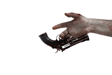 The hand of a scary zombie with blood and wounds carrying a handgun