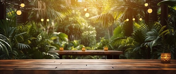 Naturally beautiful. Empty wooden table in sunlit garden. Rustic charm. Wood desk with bright outdoor background. Green serenity in park