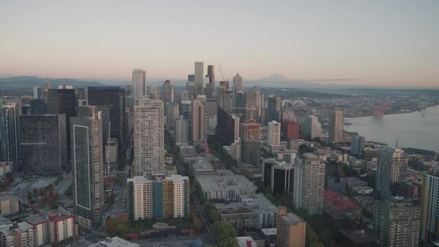 Seattle Washington Cityscape Skyline Skyscrapers and Mount Rainier on Background during Sunset