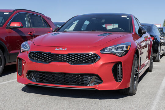 Kia Stinger display at a dealership. Kia offers the Stinger in GT-Line and GT2 models.