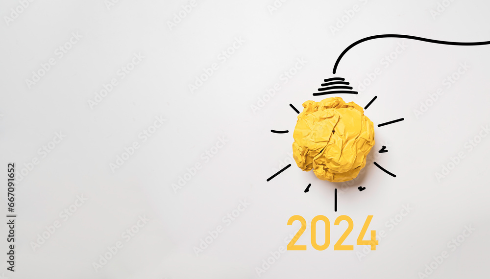 Poster yellow scrap paper ball for virtual lightbulb with 2024 on white background for creative thinking in