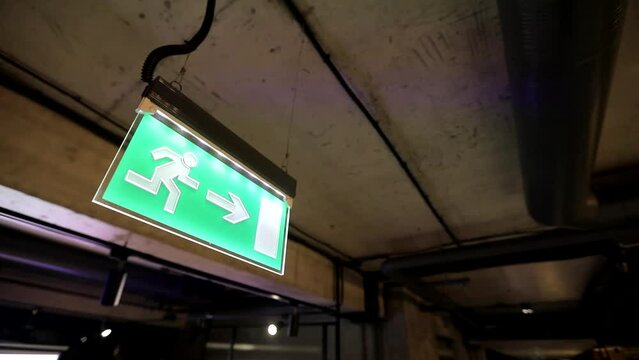 The arrow shows the direction to the exit, emergency exit