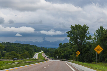 Interstate highway I-89 with bad weather on the horizon, Vermont, United States
