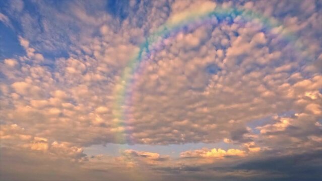 pretty  timelapse of rainbow after rain with clouds - loop video