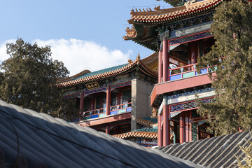 Chinese traditional buildings at Beijing summer palace. Translation on text on plaque 