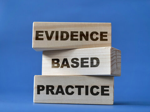 Evidence based practice, text words typography written on wooden blocks, life business and health