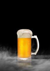 glass of beer on dark background