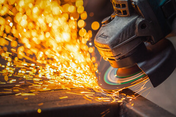 Male welder in steel welding factory.