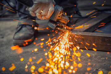 Male welder in steel welding factory.
