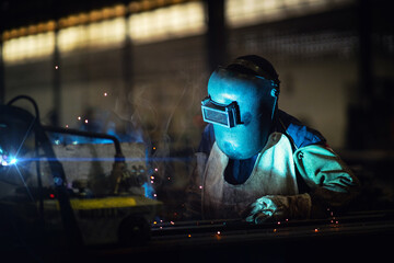 Male welder in steel welding.