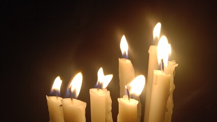 burning candles in the dark, Bright Candles in The Darkness