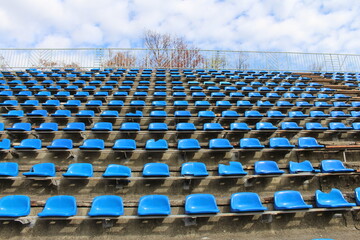 A large group of blue chairs