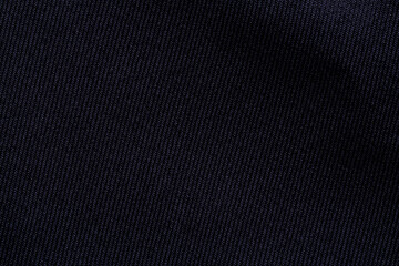 Black color sports clothing fabric football shirt jersey texture and textile background.,Smooth surface, fine black cloth, macro,