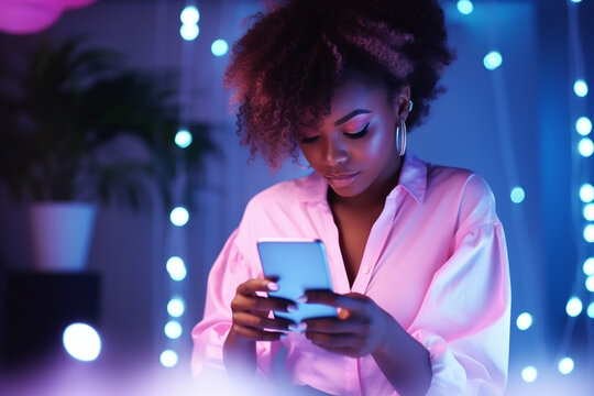 black girl portrait in her 20s female hands typing on smartphone device, working /chatting indoor environment, neon colors