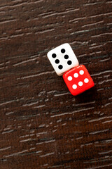 A pair of dice showing a double six on a table