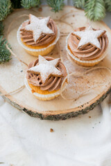 Gingerbread cookies star shaped perfect for christmass and new year on natural wooden background close up selective focus