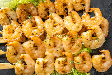 Grilled shrimp meat, shrimp kebab, yakitoriya, close-up, top view.