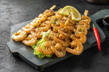 Appetizing appetizer of shrimp, shrimp on skewers, yakitori, shrimp meat.