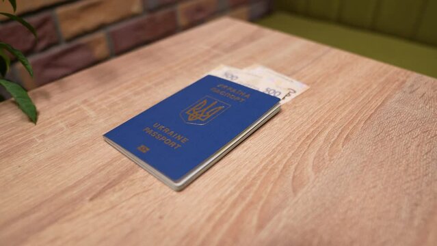 Passport of a citizen of Israel and passport of a citizen of Ukraine, repatriation, aliyah. Paper bills, new Israeli shekel and hryvnia. Absorption basket. Assistance under the Law of Return.