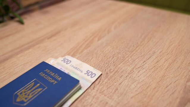 Passport of a citizen of Israel and passport of a citizen of Ukraine, repatriation, aliyah. Paper bills, new Israeli shekel and hryvnia. Absorption basket. Assistance under the Law of Return.