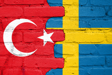 Turkey and Sweden flags painted on the brick wall