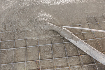 Concrete concreting floors of buildings in construction site. Concept pouring cement to base plate