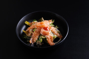 Japanese salad isolated in black background