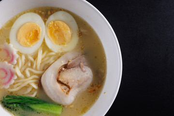 Ramen Japanese noodle isolated in black background