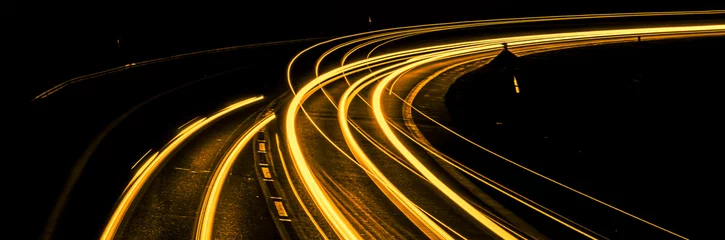 Foto op Plexiglas orange car lights at night. long exposure © Krzysztof Bubel
