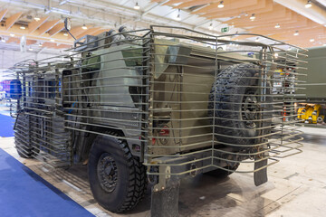 Military vehicle with camouflage netting.