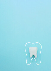 Protective vortex around tooth model on blue , teeth will good healthy.