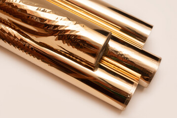 Rolls of metallized gold foil for embossing letters, words, logos on notebooks and other printing...