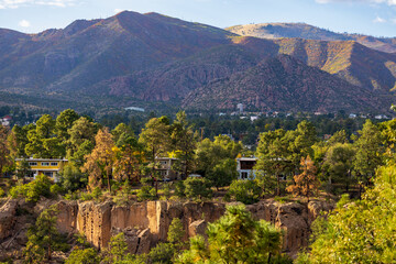 Fototapeta na wymiar Southwest living. Los Alamos Residential Panorama with the view of Los Alamos Canon and Mountains in the distance