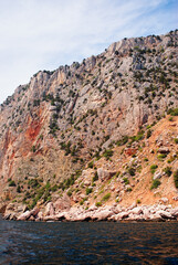 Fototapeta na wymiar Beautiful seascape with a rock cliff shore.